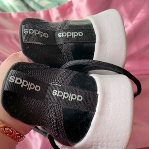 Adidas pair of size 9.5 striped pair of sneakers.